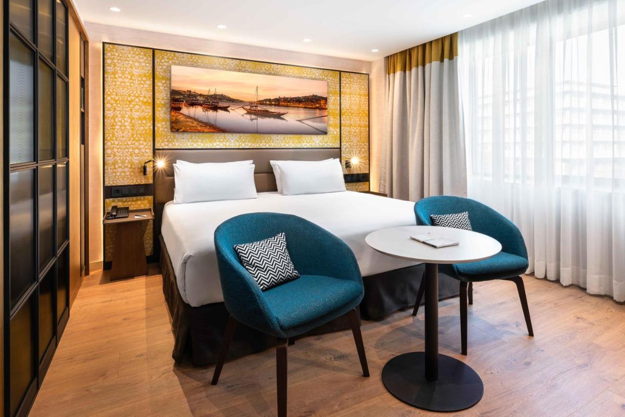 Hotel Eurostars Aliados Porto Zewnętrze zdjęcie A room at the hotel