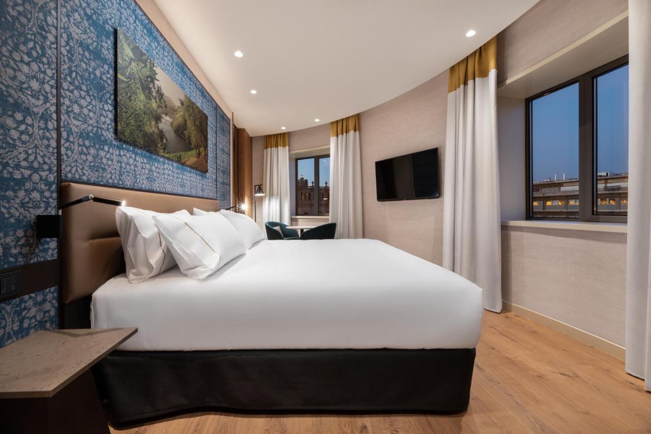 Hotel Eurostars Aliados Porto Zewnętrze zdjęcie A bedroom at the hotel