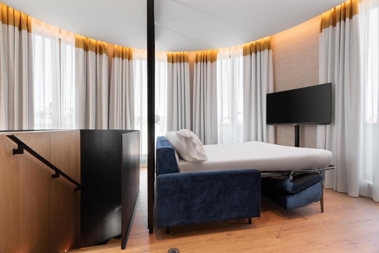 Hotel Eurostars Aliados Porto Zewnętrze zdjęcie A sofa bed